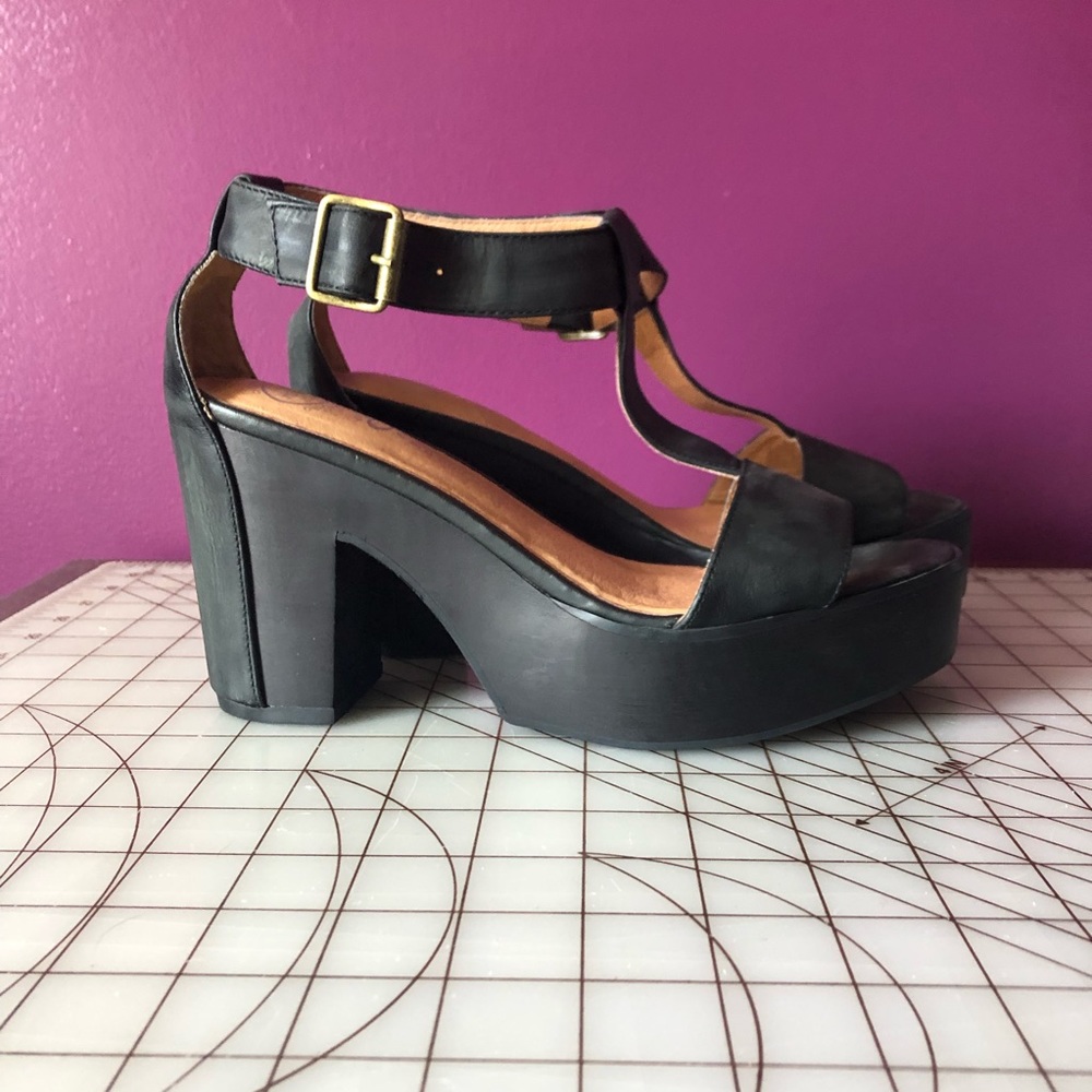 Black leather t-strap shoes